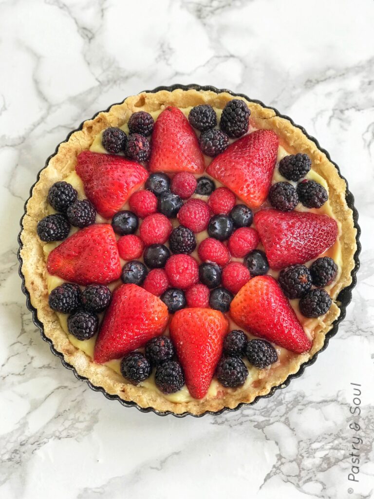 fruit tart with blackberries, strawberries, blueberries and raspberries